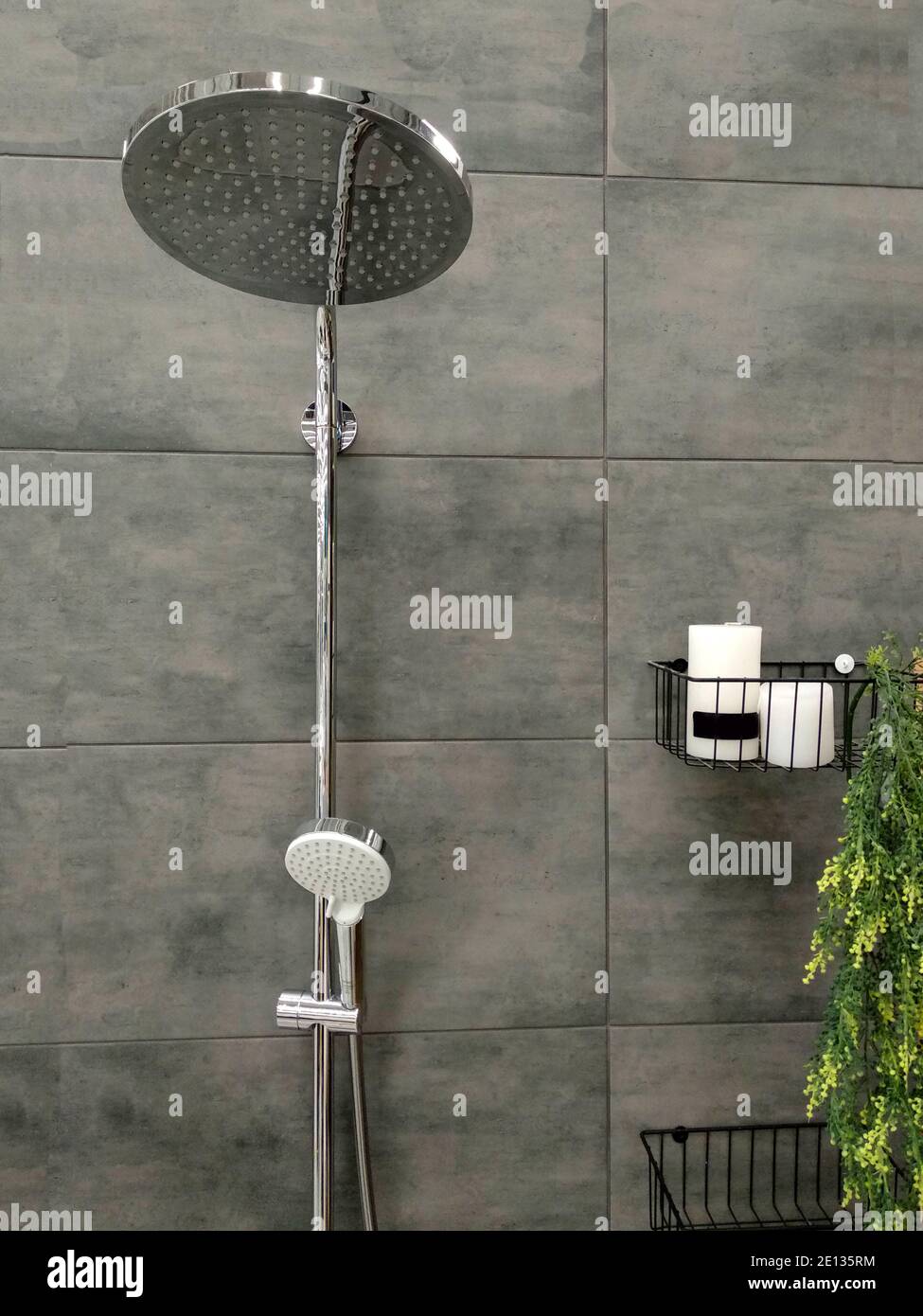 Luxury fully tiled shower with rain head and hand held shower rose