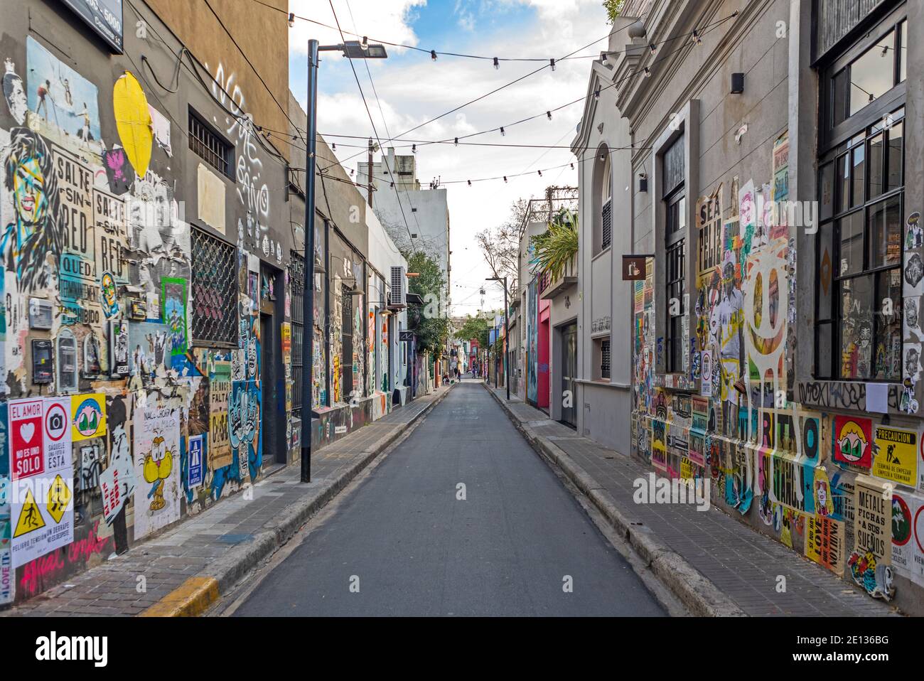 Wall art in a narrow street in Palermo Viejo district, city of Buenos Aires, Argentina, South America. Palermo is famous for graffiti and art gallery Stock Photo