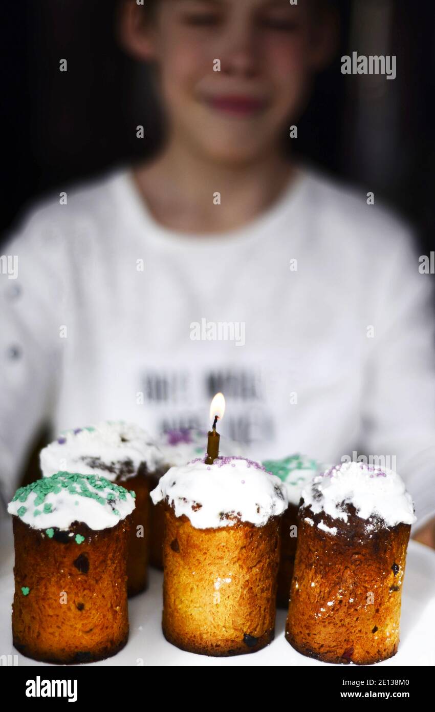 A person standing in front of a cake. High quality photo Stock Photo