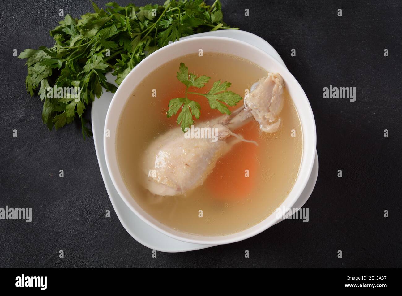 Chicken bouillon broth, boiled meat chicken leg Stock Photo Alamy