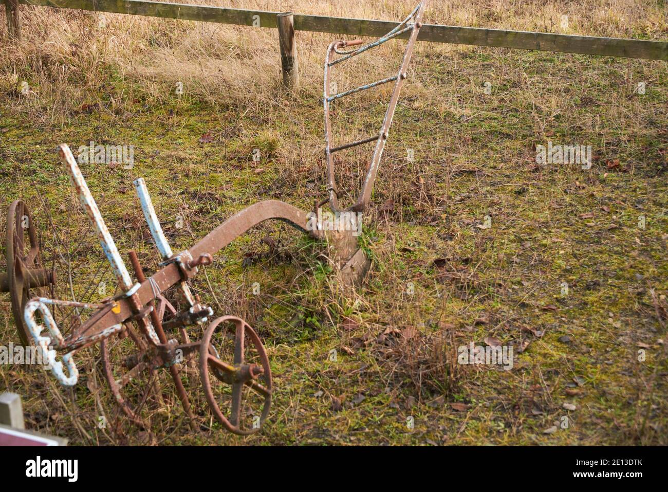 Old farming machinery in field, old horse plough made by Boxmoor Ironworks Stock Photo