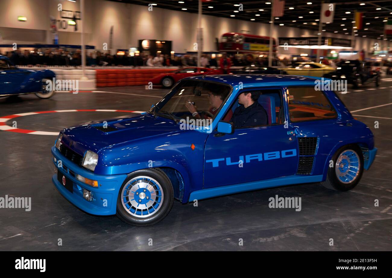 A Blue, Renault 5 Turbo, driving down the 'Grand Avenue' at the 2016 London Classic Car Show Stock Photo