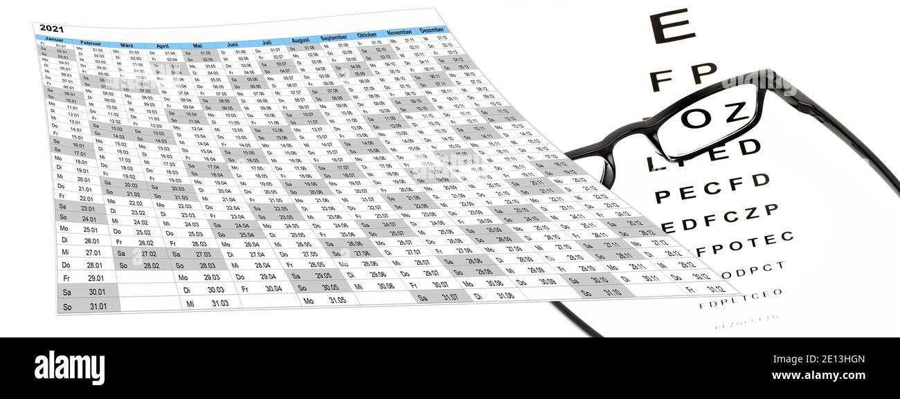 Kalender mit Sehtest und Brille, Terminvergabe Stock Photo