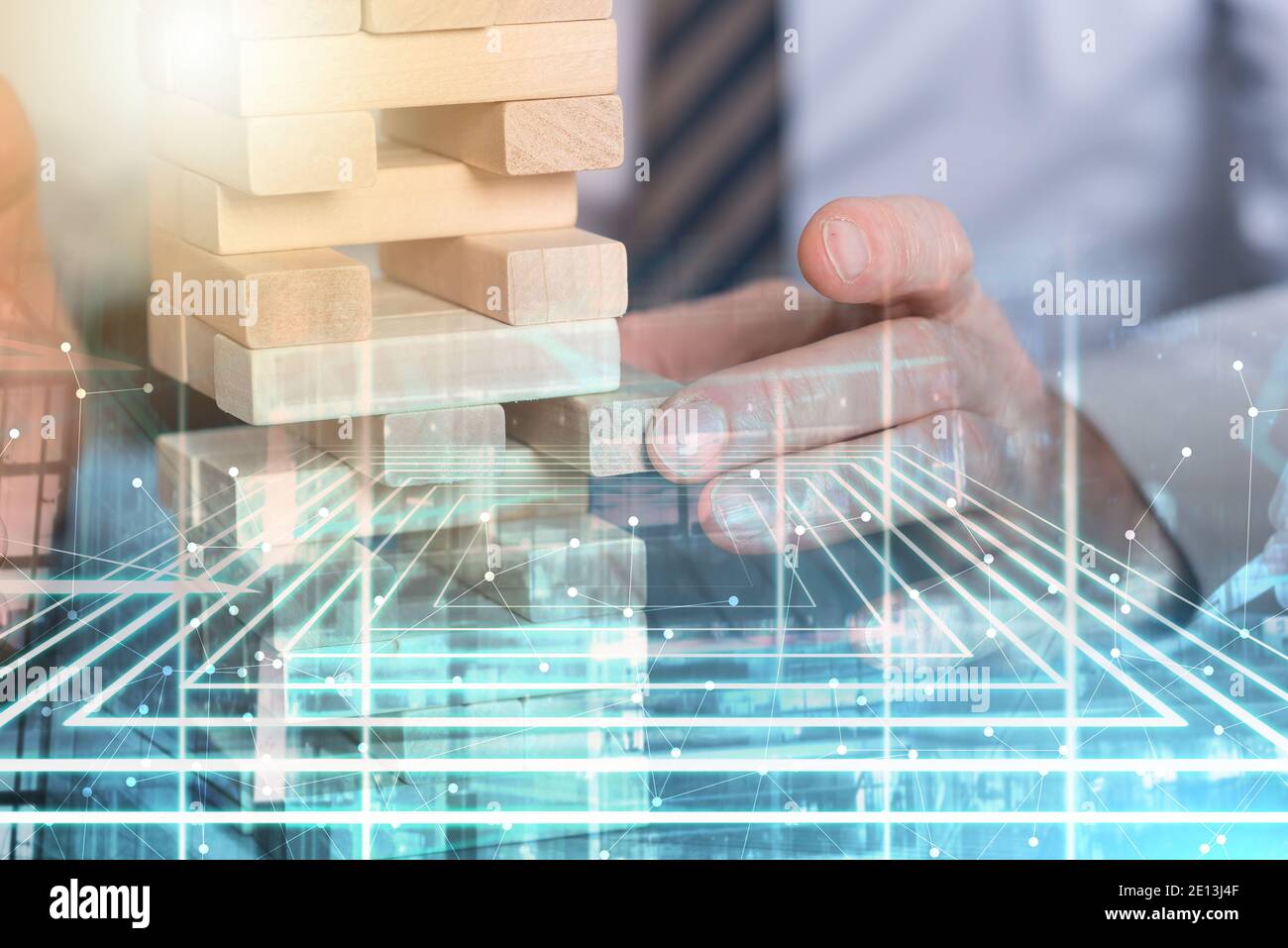 Concept of business risk with domino blocks; multiple exposure Stock ...