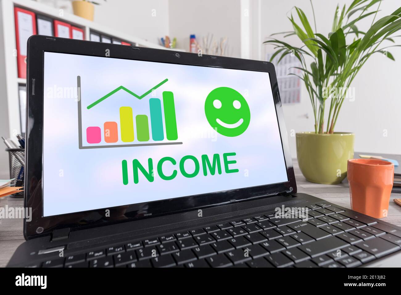 Laptop screen with income growth concept Stock Photo - Alamy