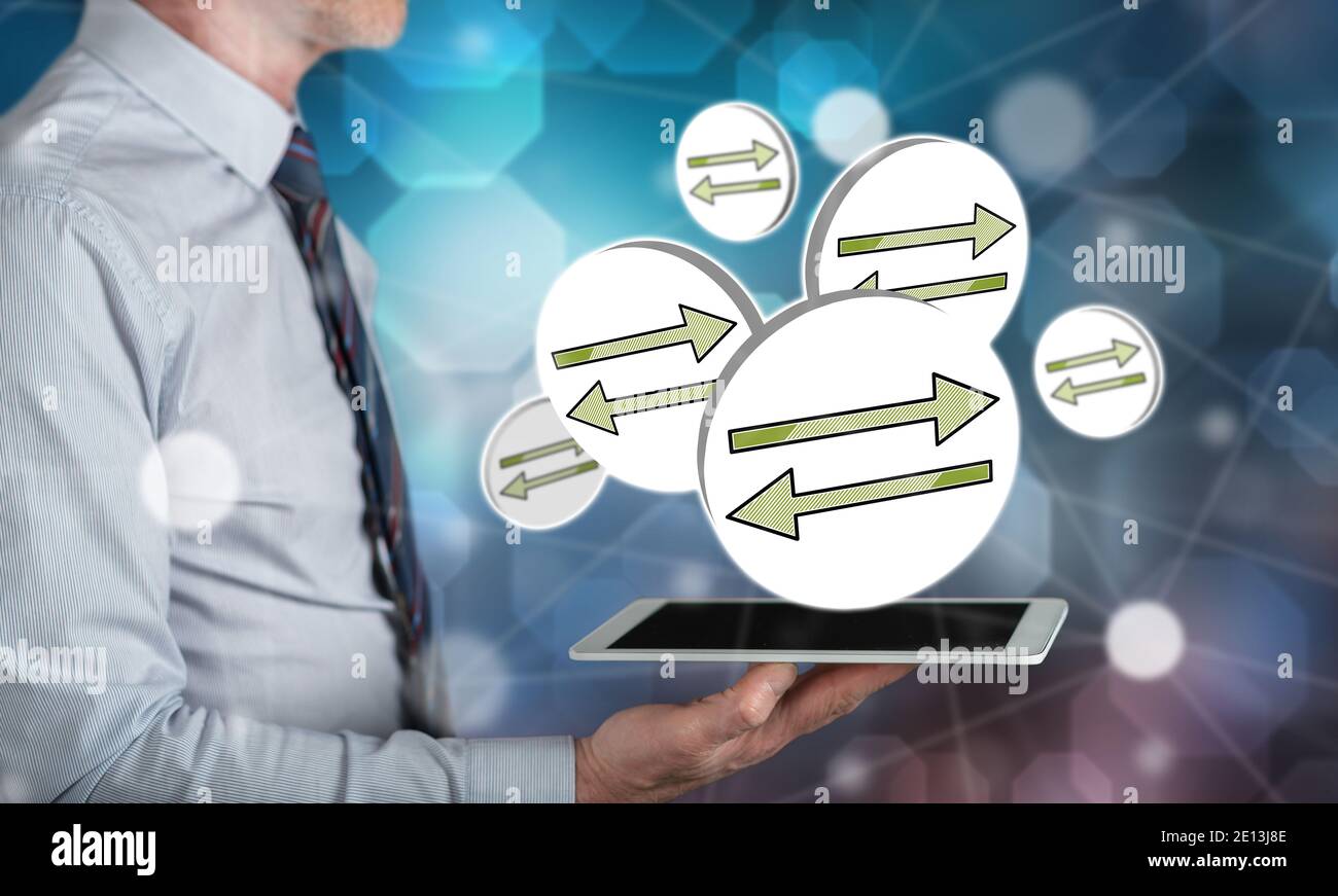Decision concept above a tablet held by a man Stock Photo