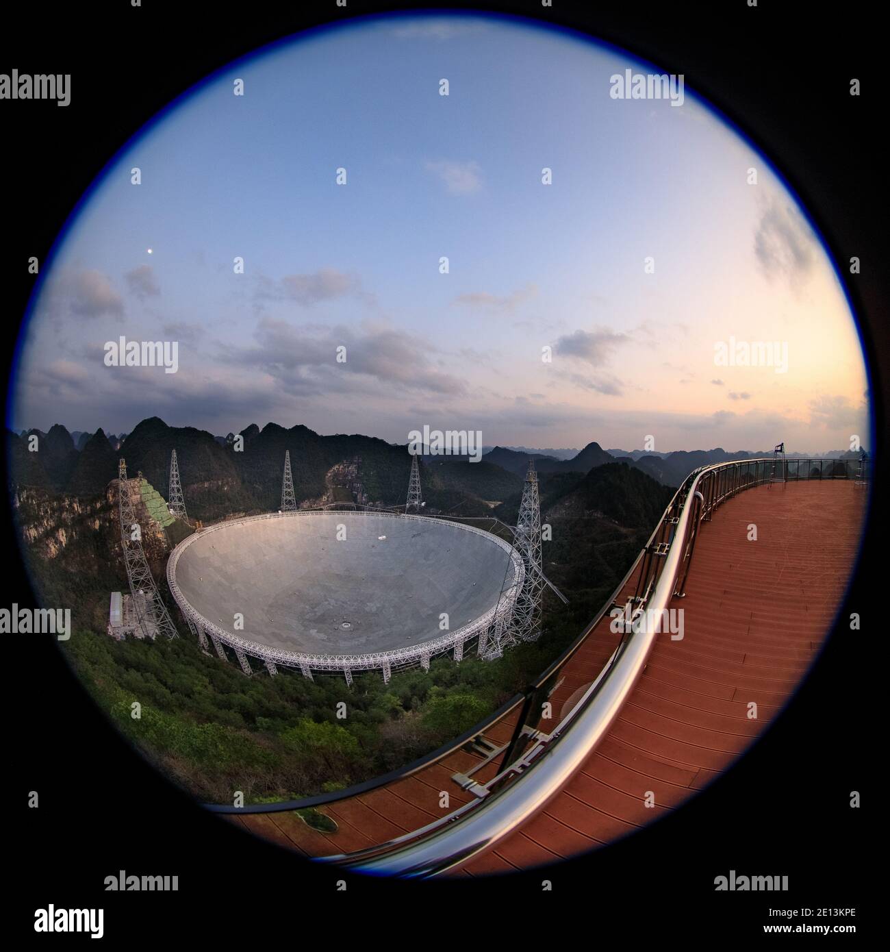 (210104) -- GUIYANG, Jan. 4, 2021 (Xinhua) -- Photo taken on Jan. 8, 2020 shows China's Five-hundred-meter Aperture Spherical Radio Telescope (FAST) under maintenance in southwest China's Guizhou Province. China's FAST, the world's largest single-dish radio telescope, will be available for global service from April 1. The National Astronomical Observatories of China (NAOC) of the Chinese Academy of Sciences, the operator of the telescope, confirmed Monday that scientists across the world can make online appointments for using the device for observation from April 1. An allotted timetable wil Stock Photo