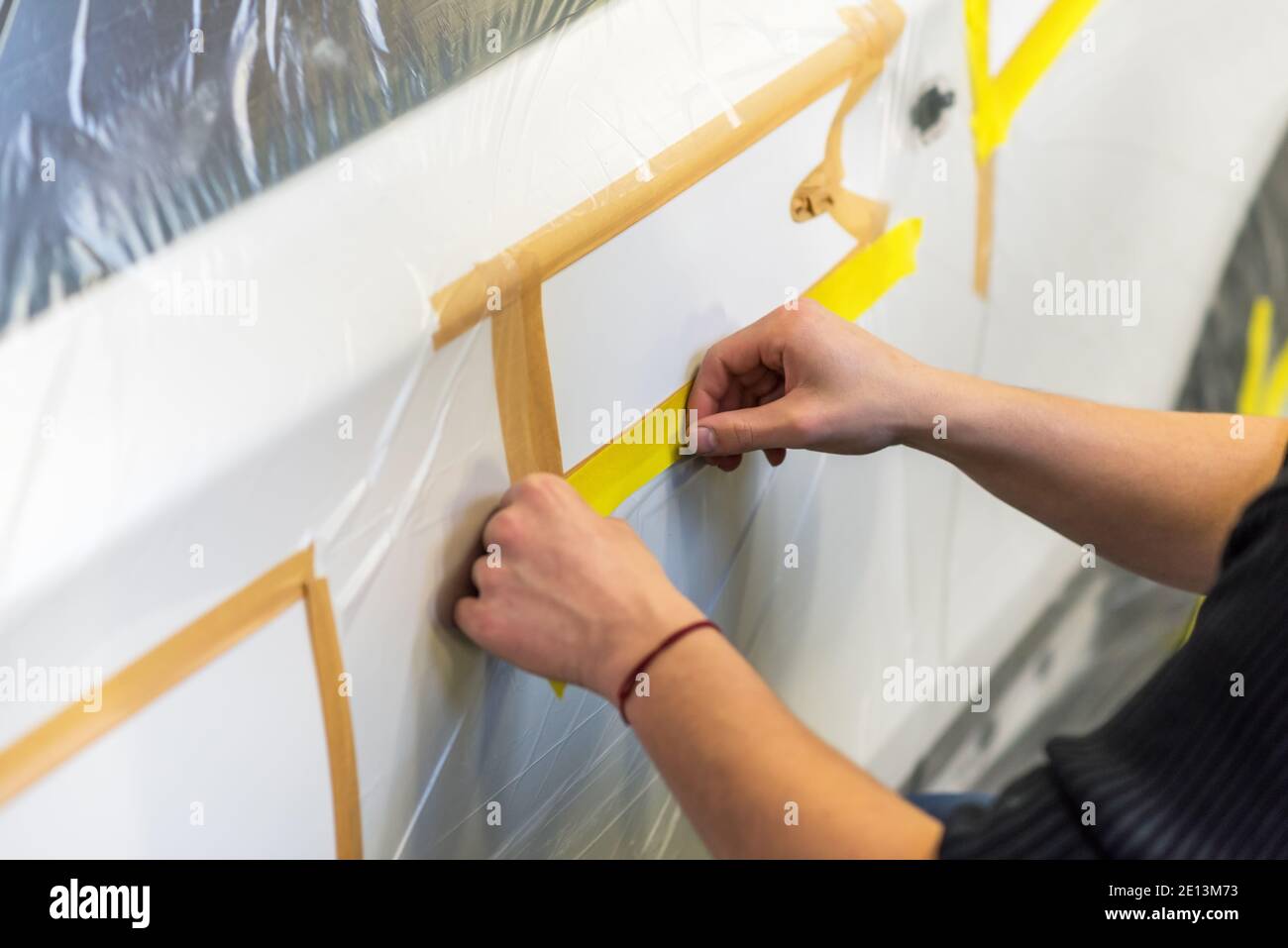 Auto body repair series. Masking car before repaint Stock Photo Alamy