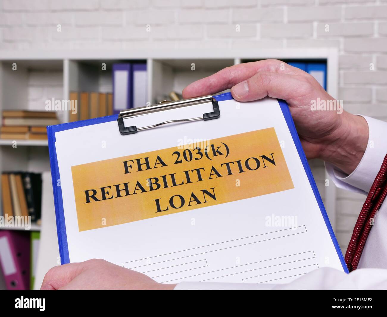 FHA 203k rehabilitation loan application form for signing. Stock Photo