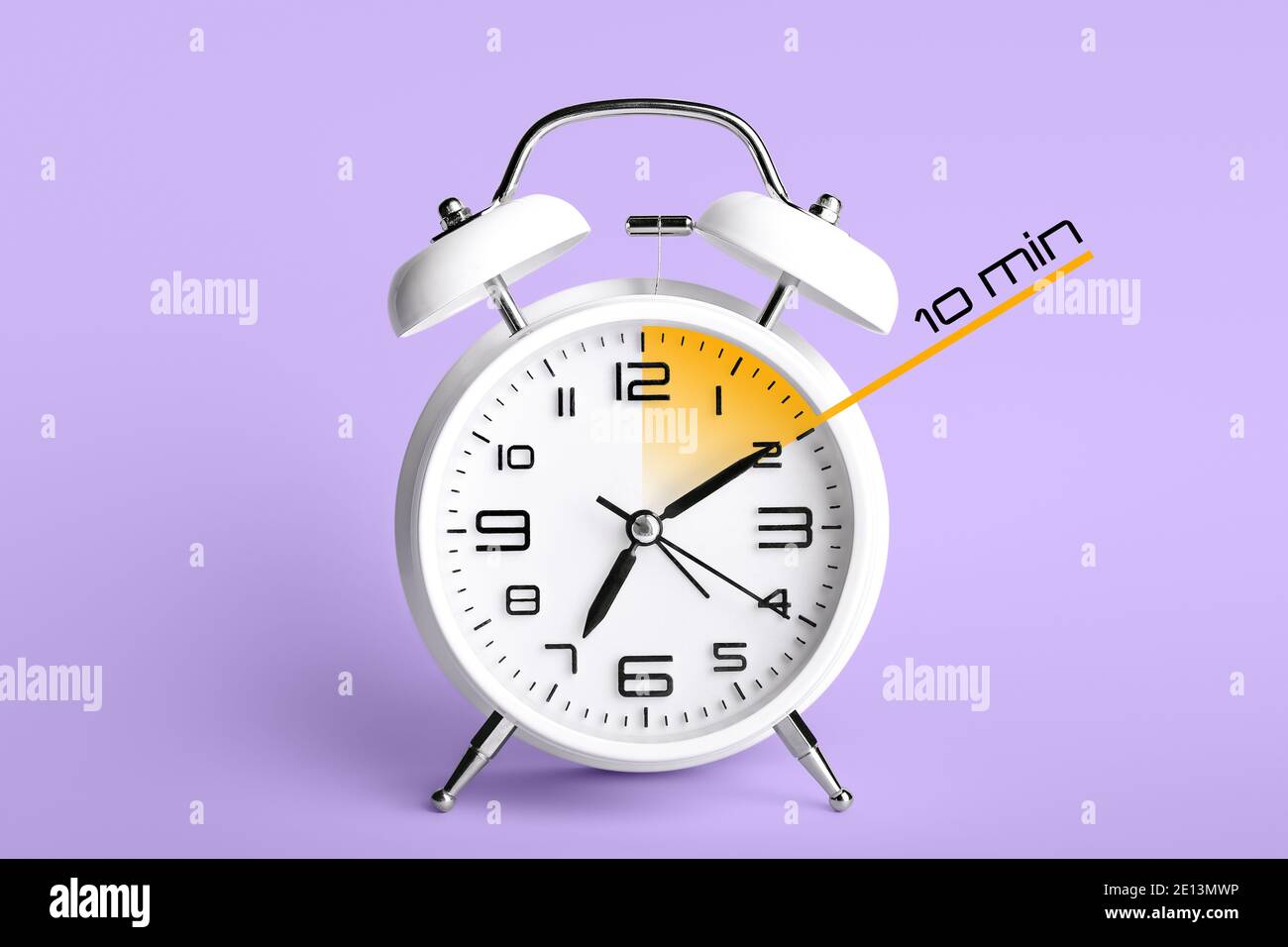 Alarm clock with timer for 10 minutes on color background. Time