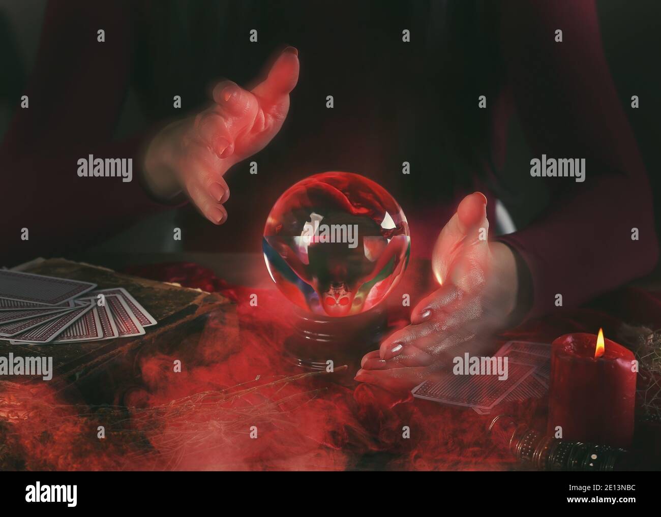 Fortune teller with crystal ball at table, closeup Stock Photo - Alamy