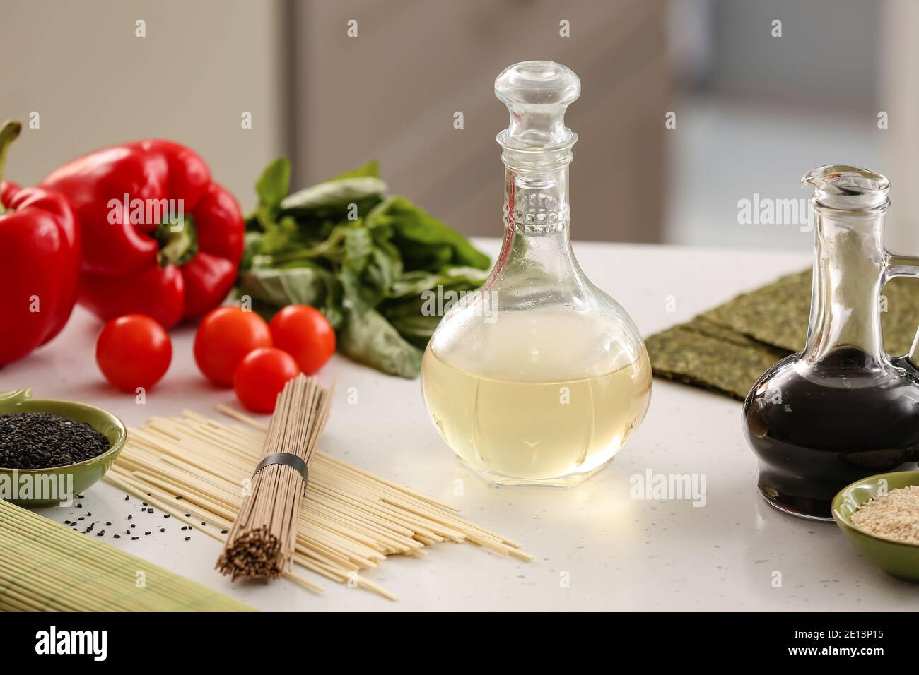 Composition with rice vinegar  on table Stock Photo