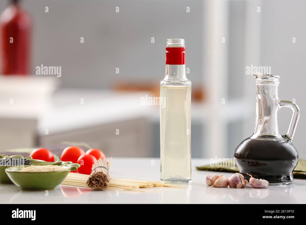 Composition with rice vinegar  on table Stock Photo