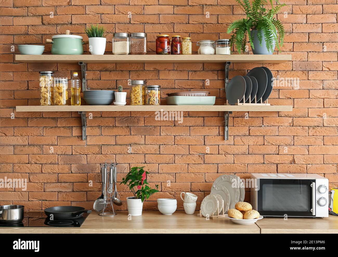 Interior of modern kitchen with shelves Stock Photo - Alamy
