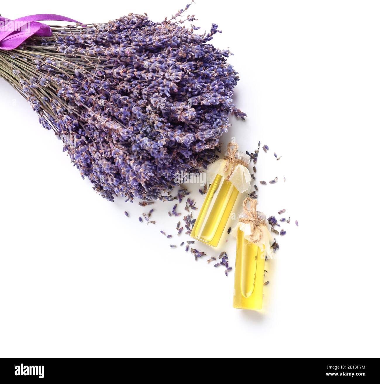 Bottles with lavender essential oil on white background Stock Photo - Alamy