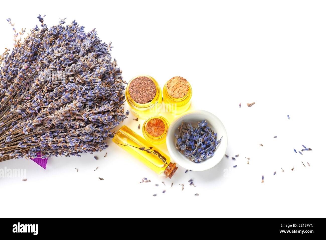 Bottles with lavender essential oil on white background Stock Photo - Alamy