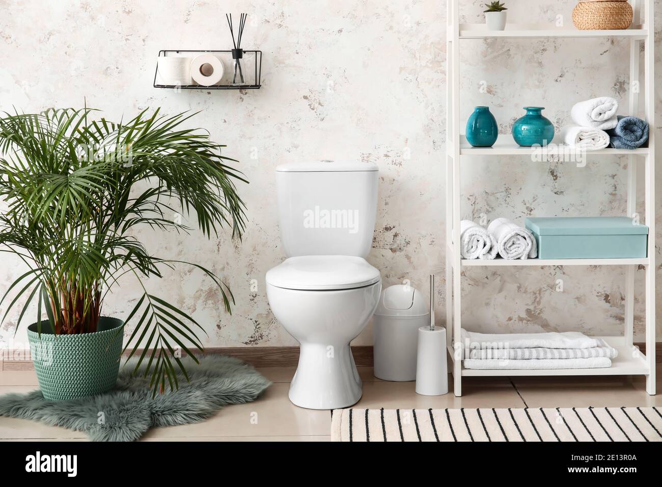 Modern toilet bowl in interior of bathroom Stock Photo - Alamy