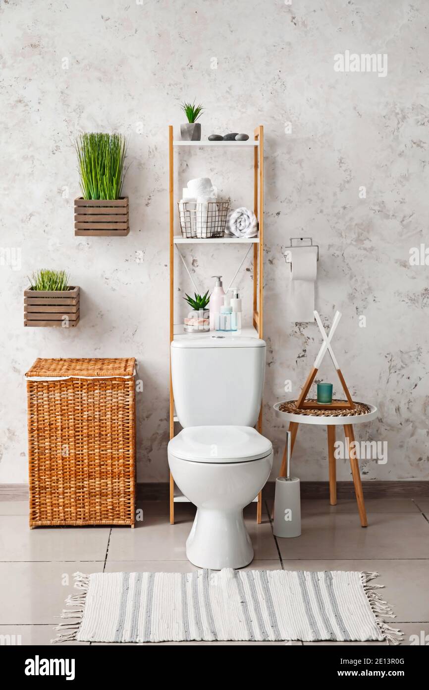Modern toilet bowl in interior of bathroom Stock Photo - Alamy