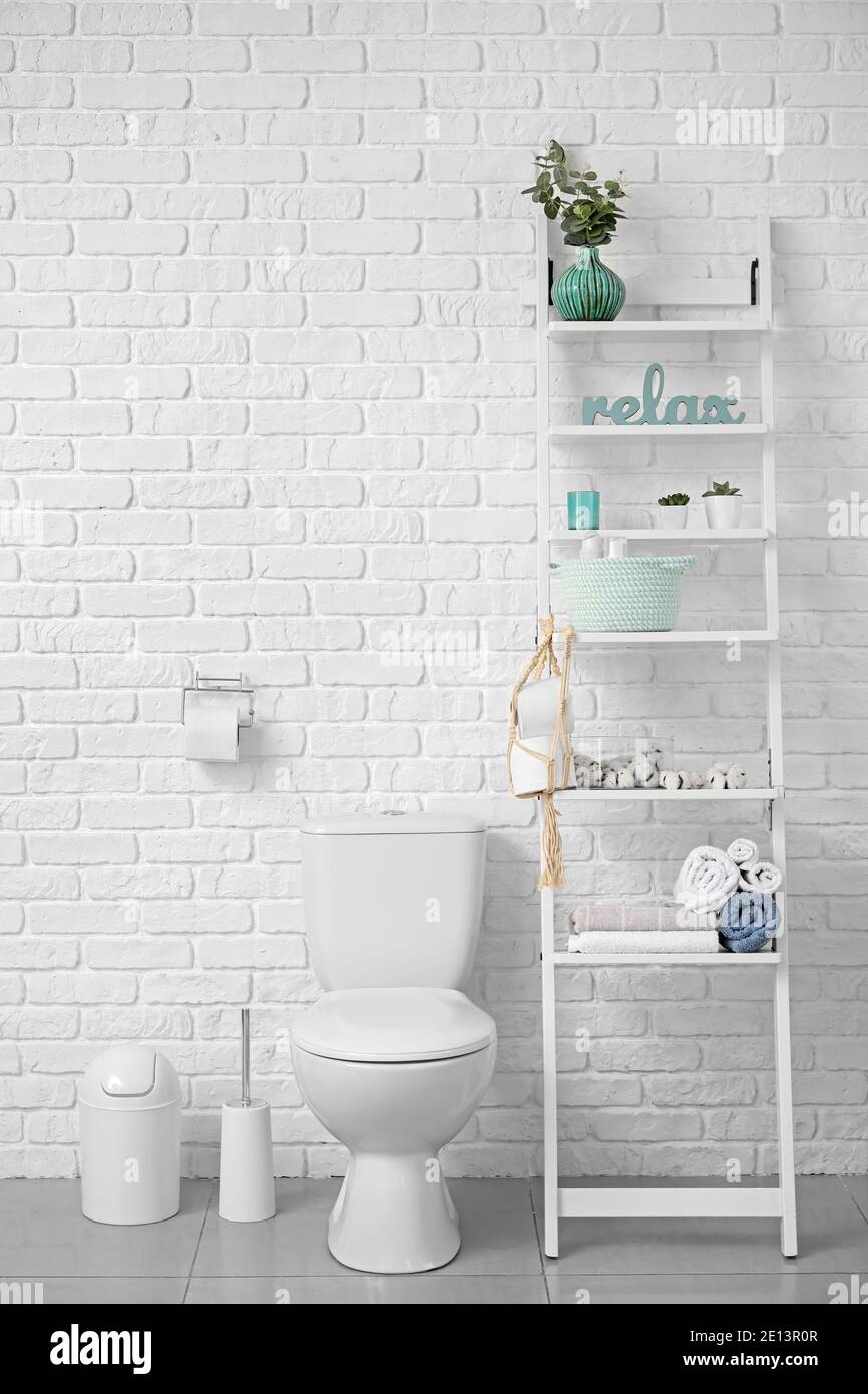 Modern toilet bowl in interior of bathroom Stock Photo - Alamy