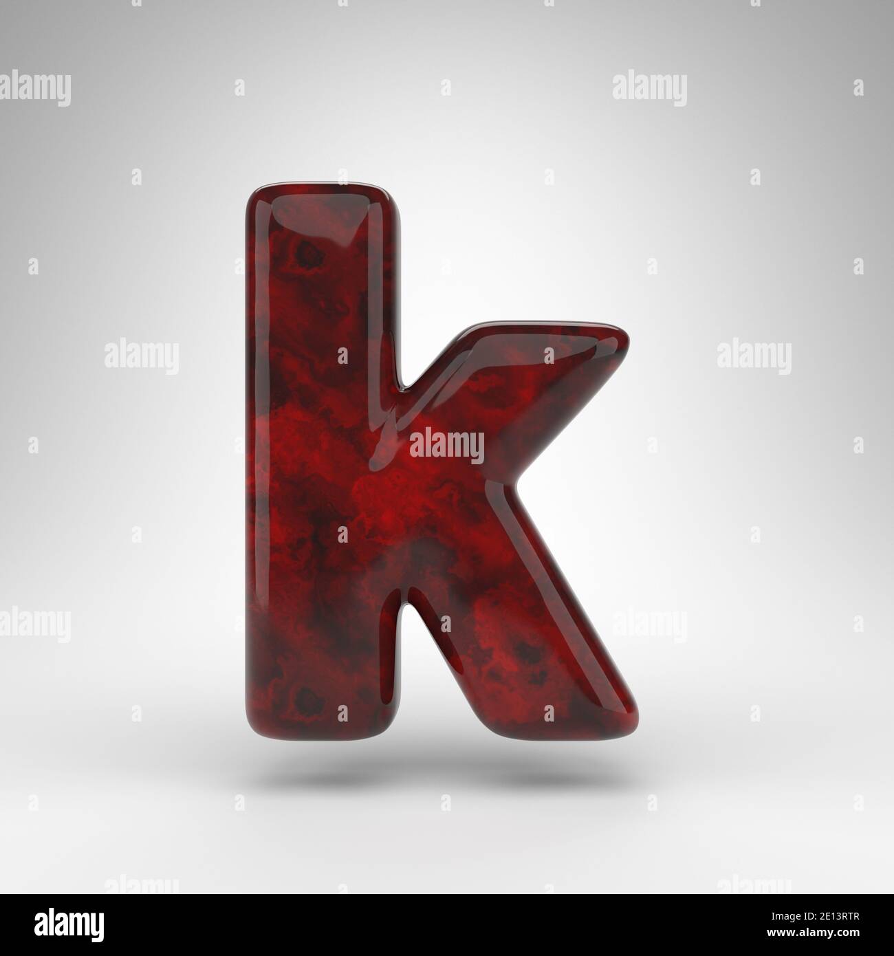 Letter K lowercase on white background. Red amber 3D rendered font with glossy surface. Stock Photo