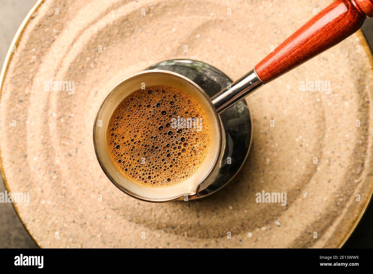 Turkish coffee cooked in sand, closeup Stock Photo Alamy