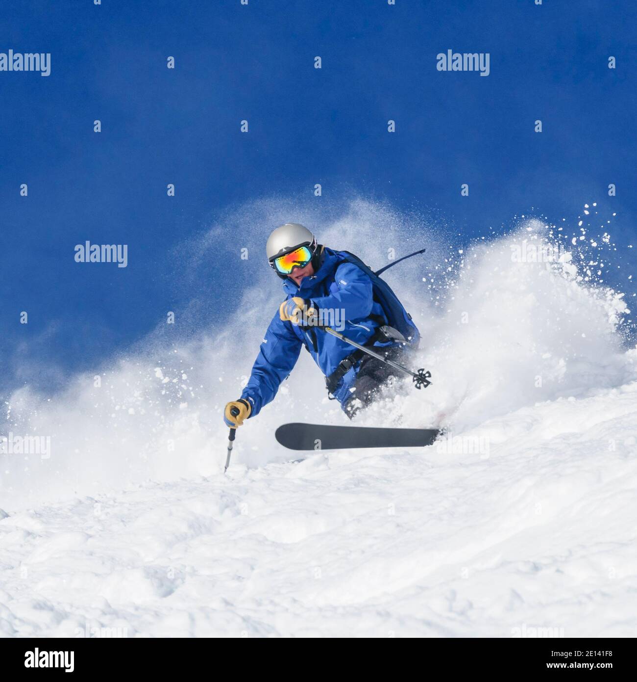 Telemark skier skiing on steep offpiste slope Stock Photo Alamy