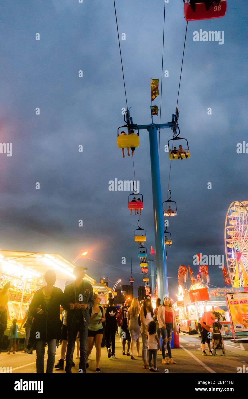 People attend the annual Canadian National Exhibition aka CNE, with the ...