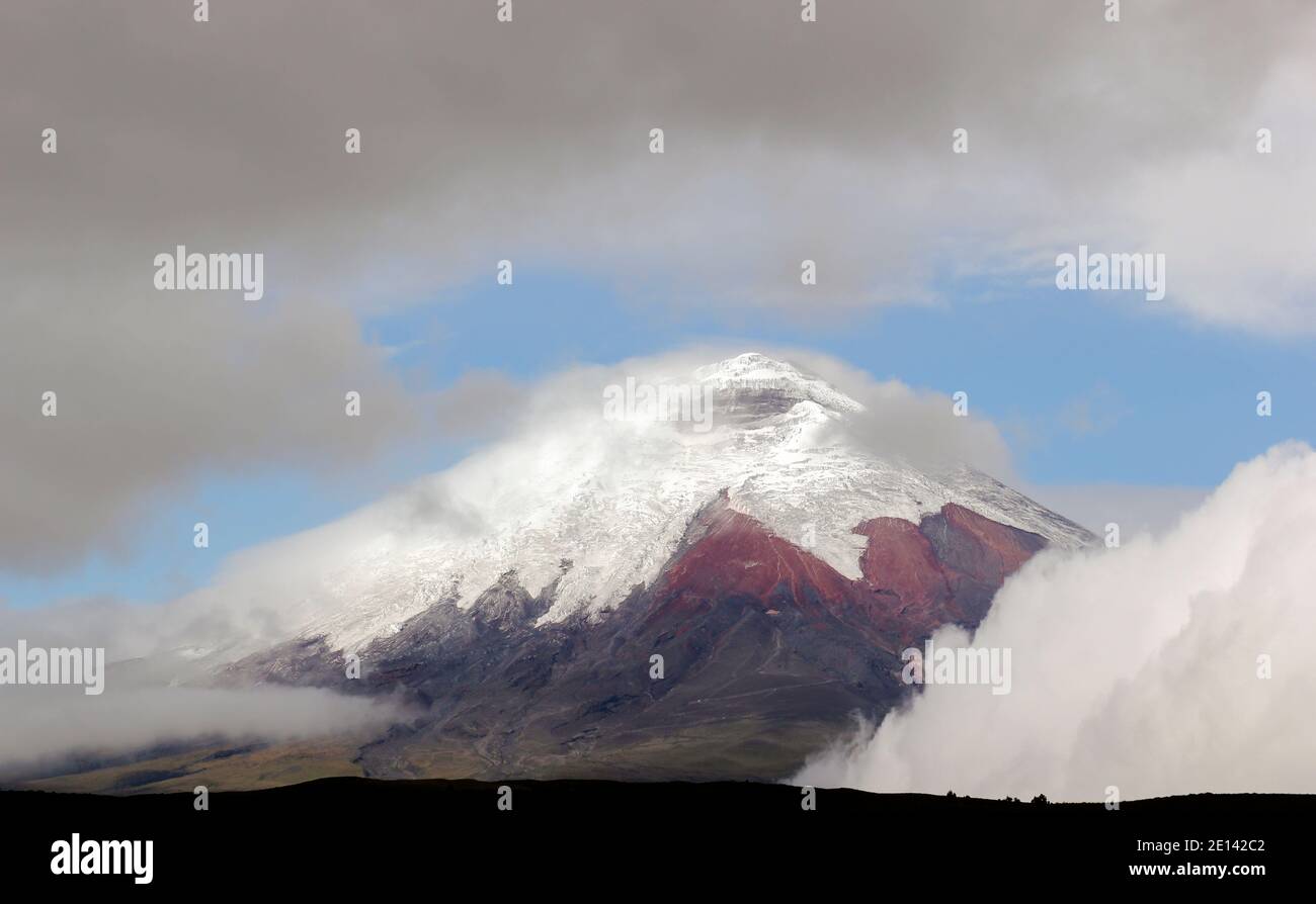 The snowcapped Cotopaxi Volcano in the Ecuadorian Andes Stock Photo