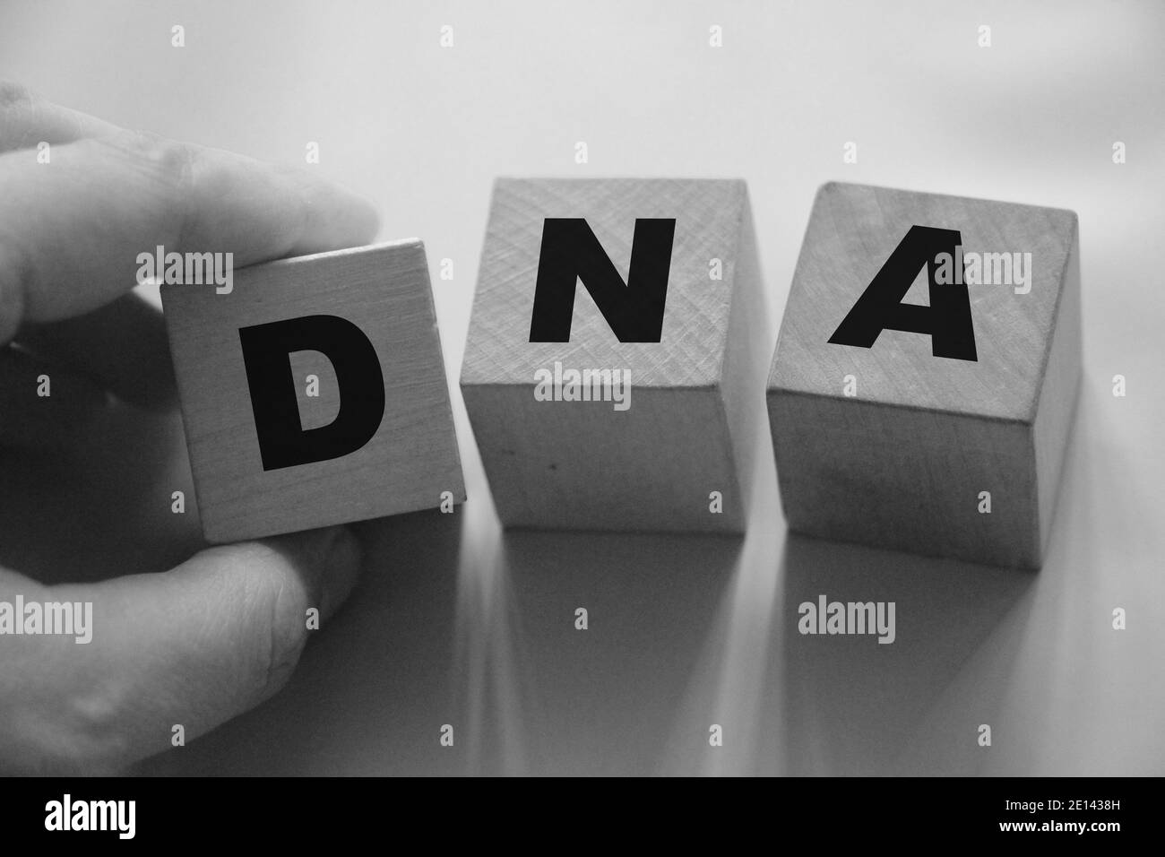 DNA abbreviation on wooden Building Blocks. Genetics concept. Stock Photo