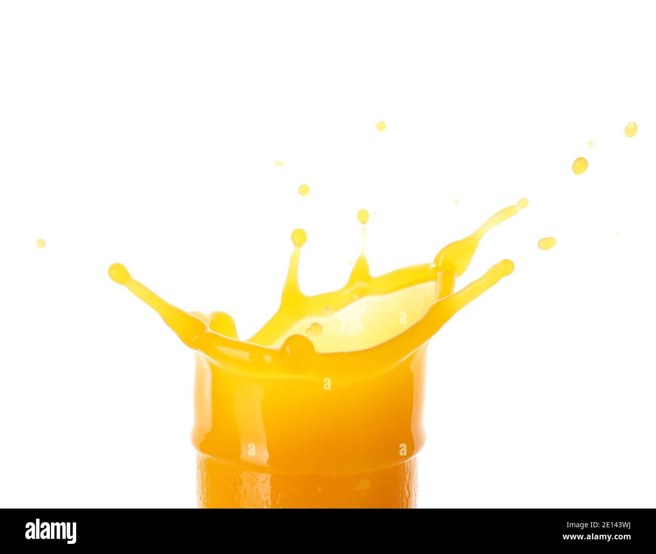 Splash of fresh mango juice on white background Stock Photo - Alamy