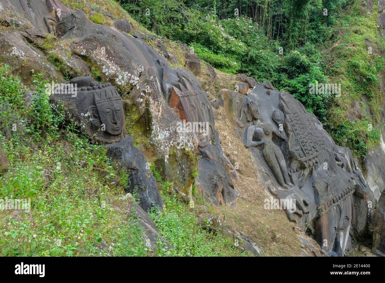 Sculptures carved into the rock at the archaeological site of Unakoti in the state of Tripura. India. Stock Photo