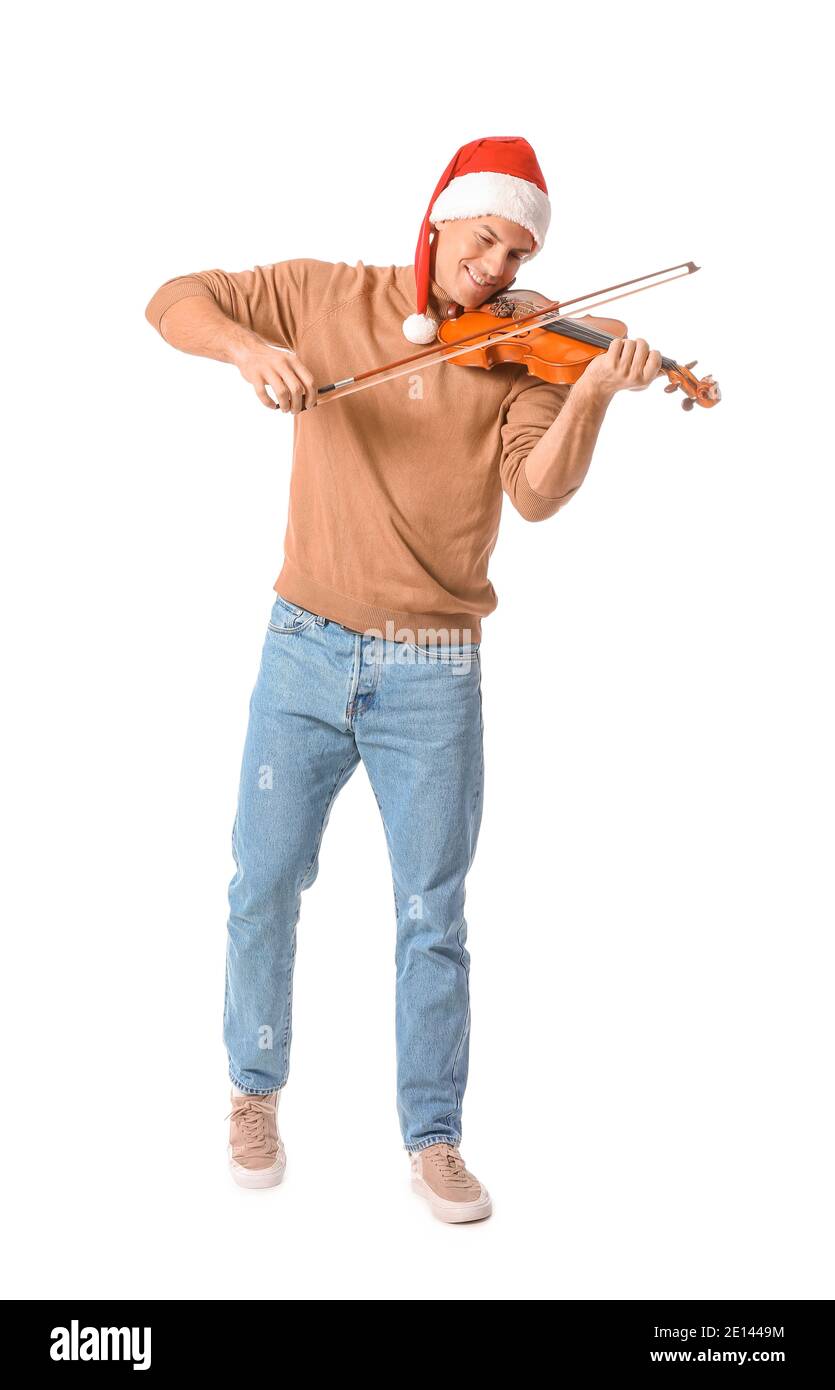Young man playing violin on white background Stock Photo