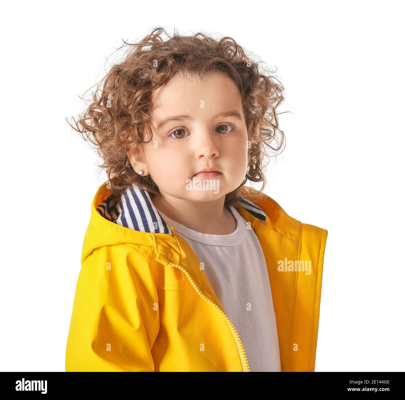 Cute baby girl in raincoat on white background Stock Photo Alamy
