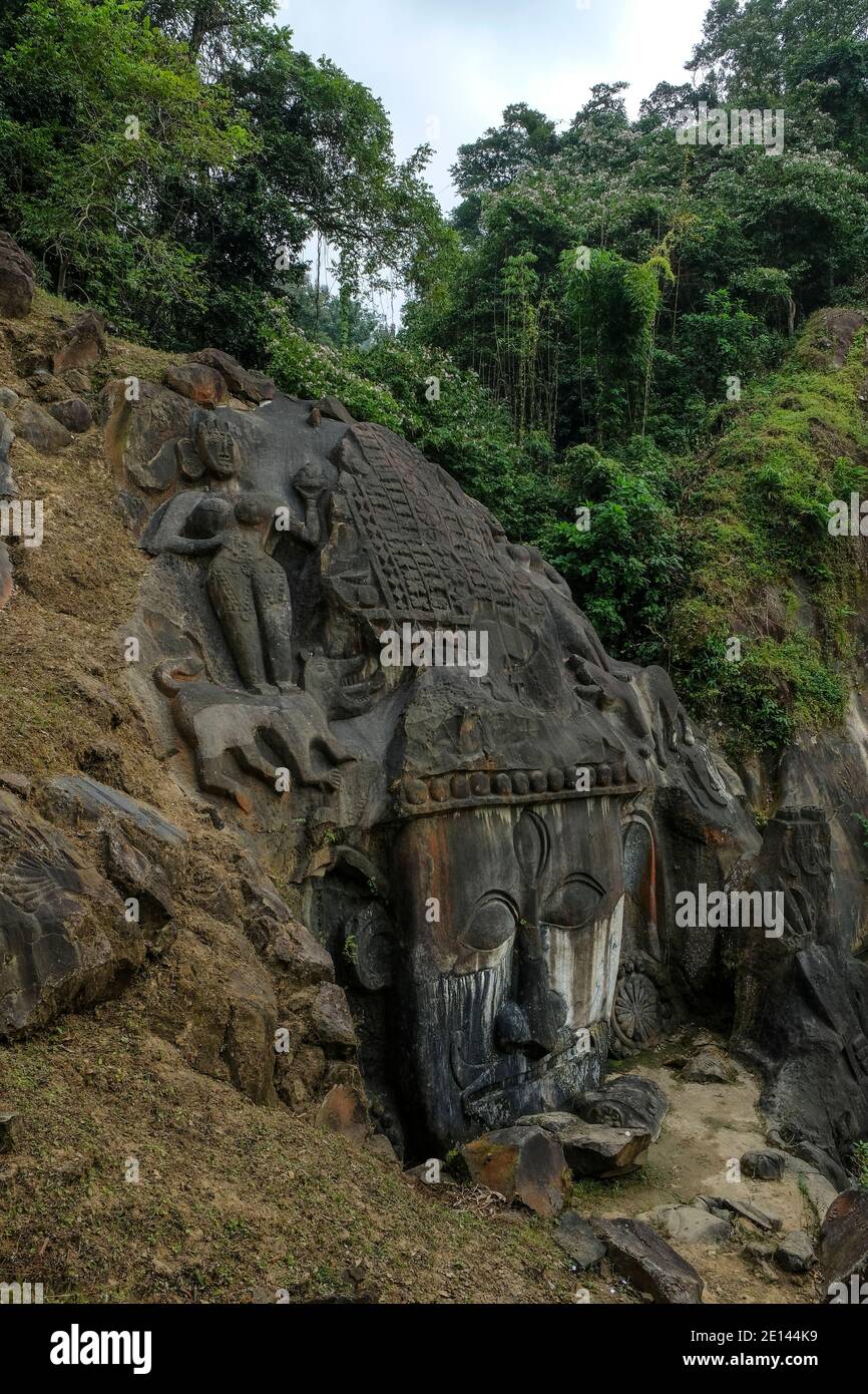 Sculptures carved into the rock at the archaeological site of Unakoti