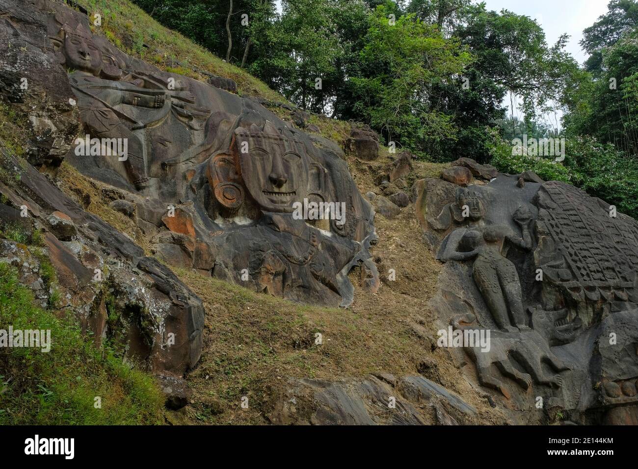 Sculptures carved into the rock at the archaeological site of Unakoti