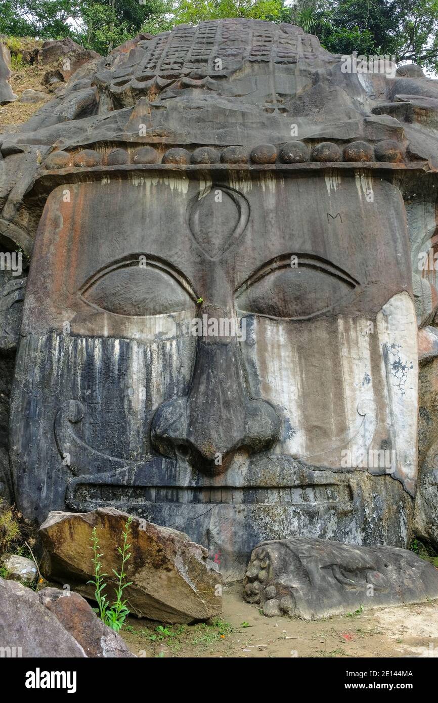 Sculptures carved into the rock at the archaeological site of Unakoti