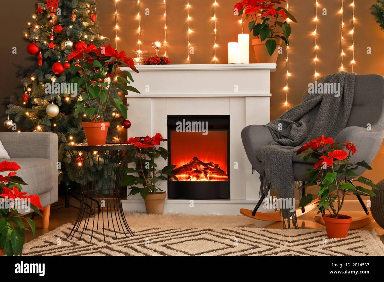 Interior of living room with fireplace decorated for Christmas Stock ...