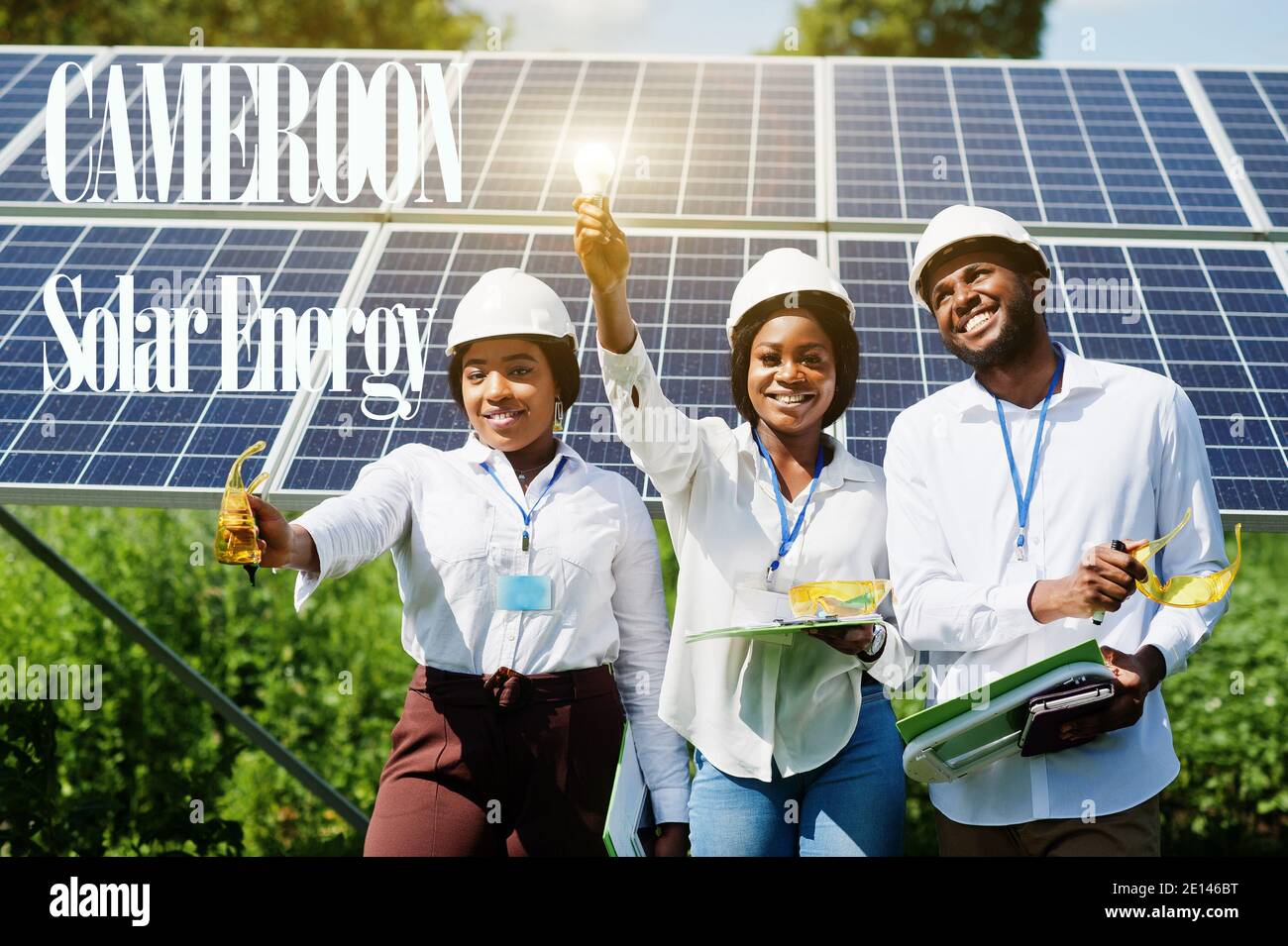 Cameroon solar energy. African engineers at panels station. Stock Photo