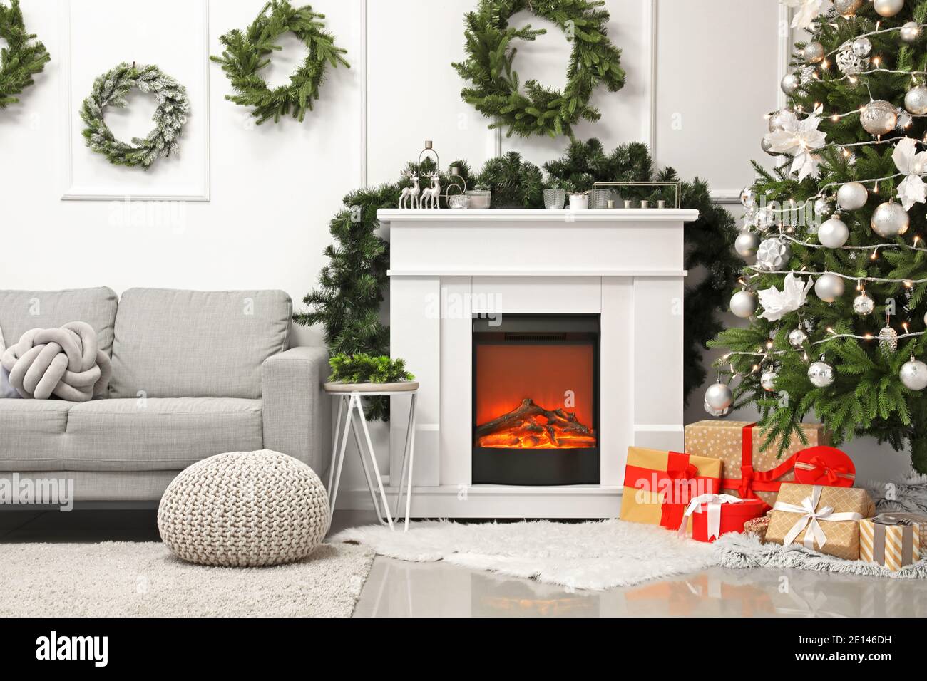 Interior of living room with fireplace decorated for Christmas Stock ...