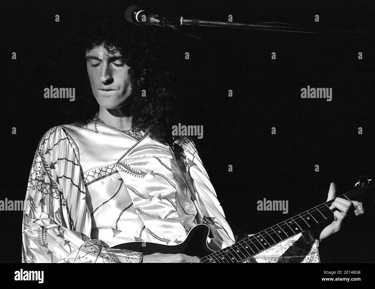 Brian May guitarist of Queen. Live in Hyde Park London 18/9/1976. Free concert with 150,000 fans in the Park. Stock Photo