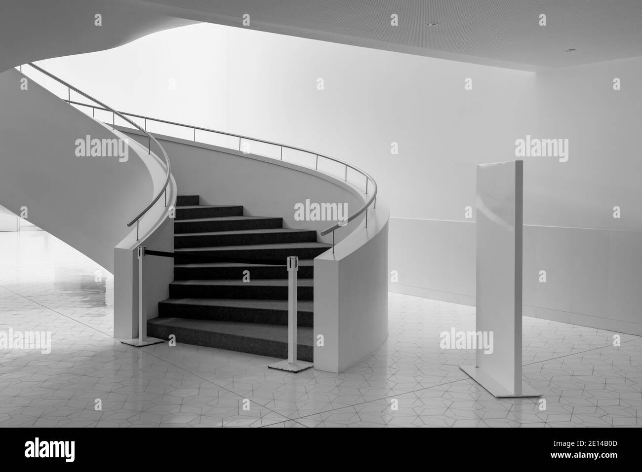 Stairs In A White Hallway Stock Photo