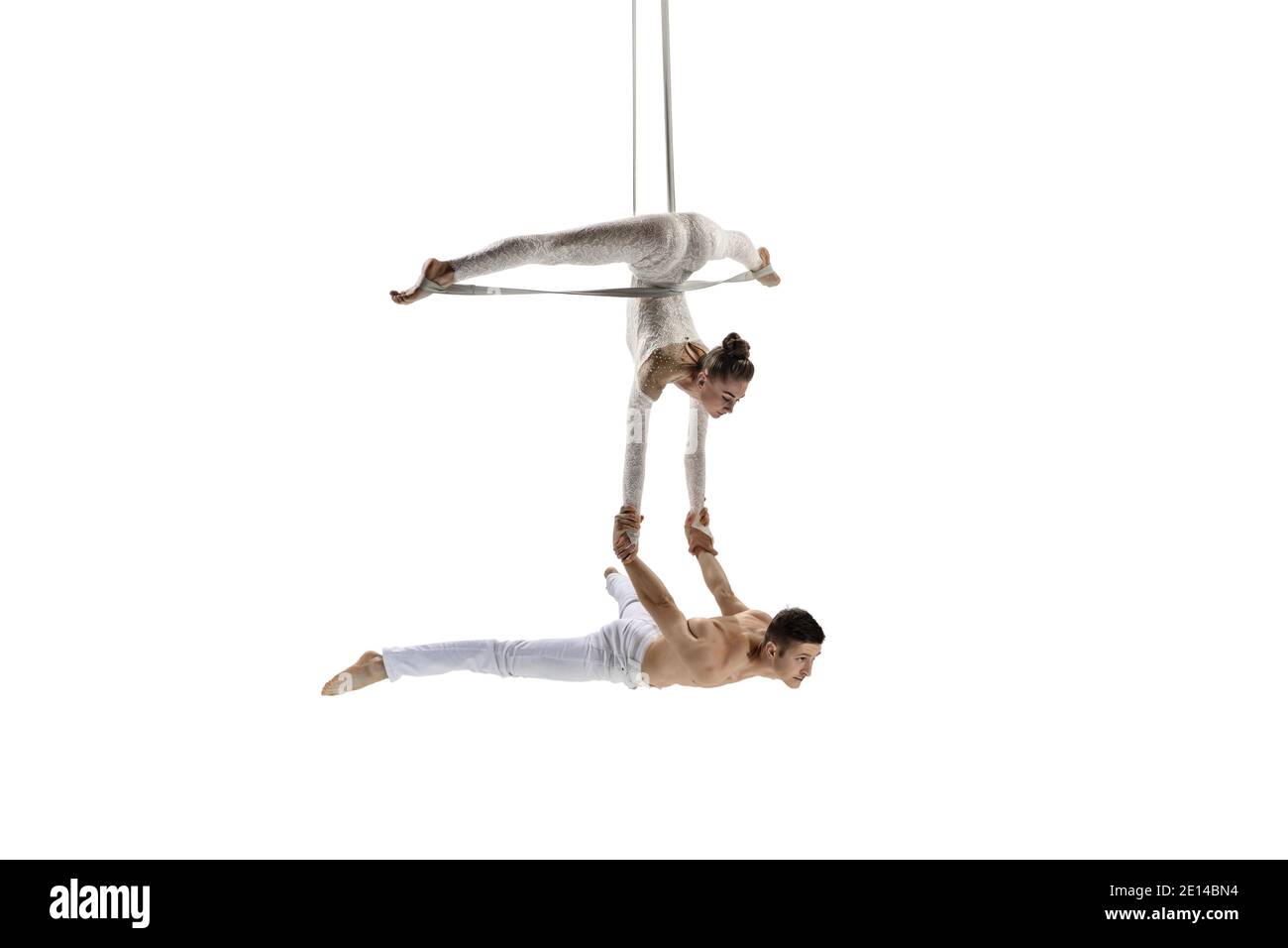 Support. Couple of acrobats, circus athletes isolated on white studio
