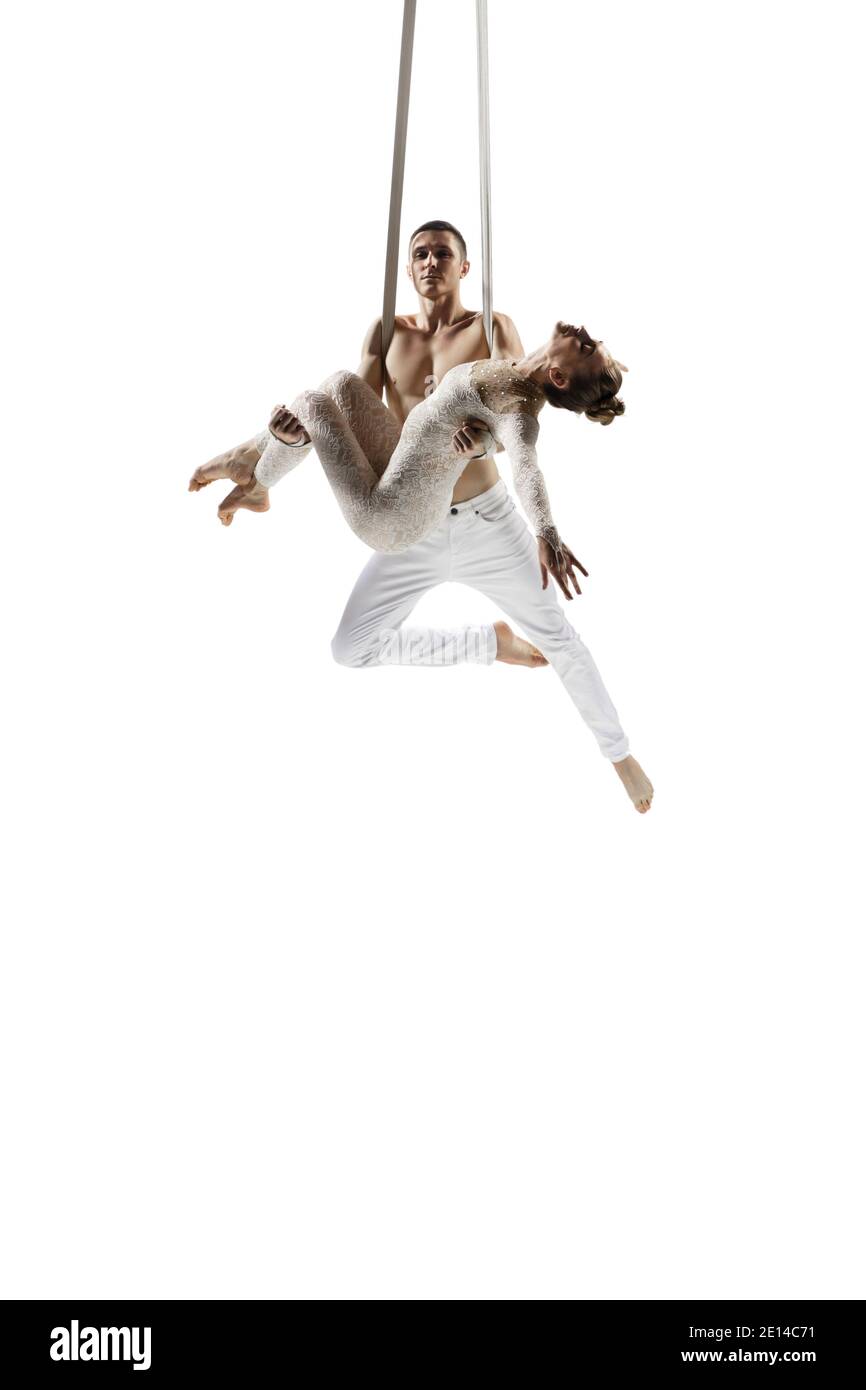 Princess. Couple of acrobats, circus athletes isolated on white studio ...