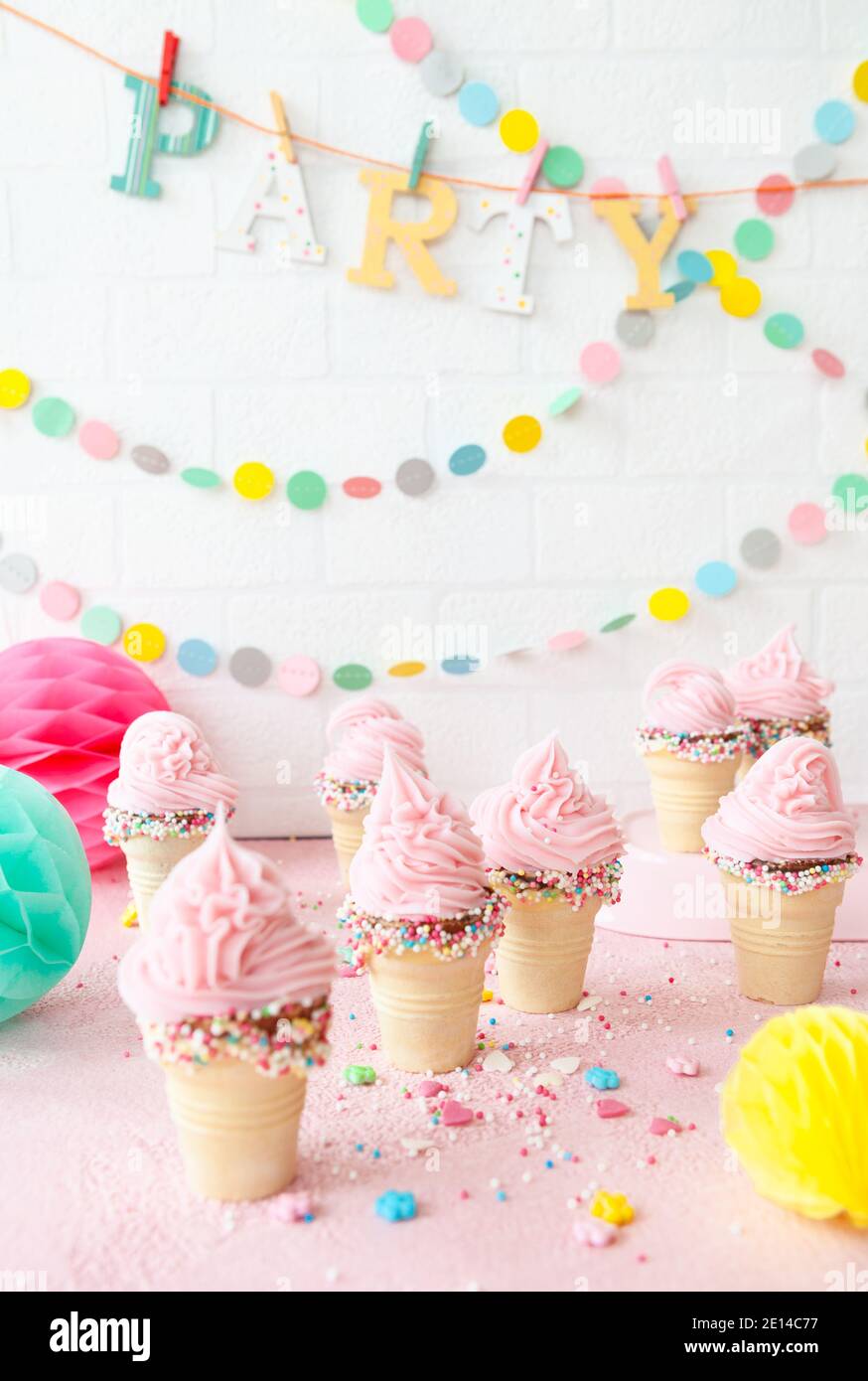 Pink Soft Serve Ice Cream With Sprinkles Stock Photo - Alamy