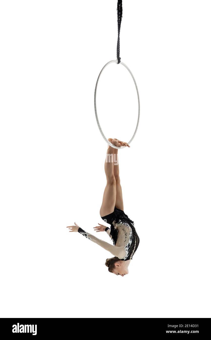 Professional. Young female acrobat, circus athlete isolated on white ...