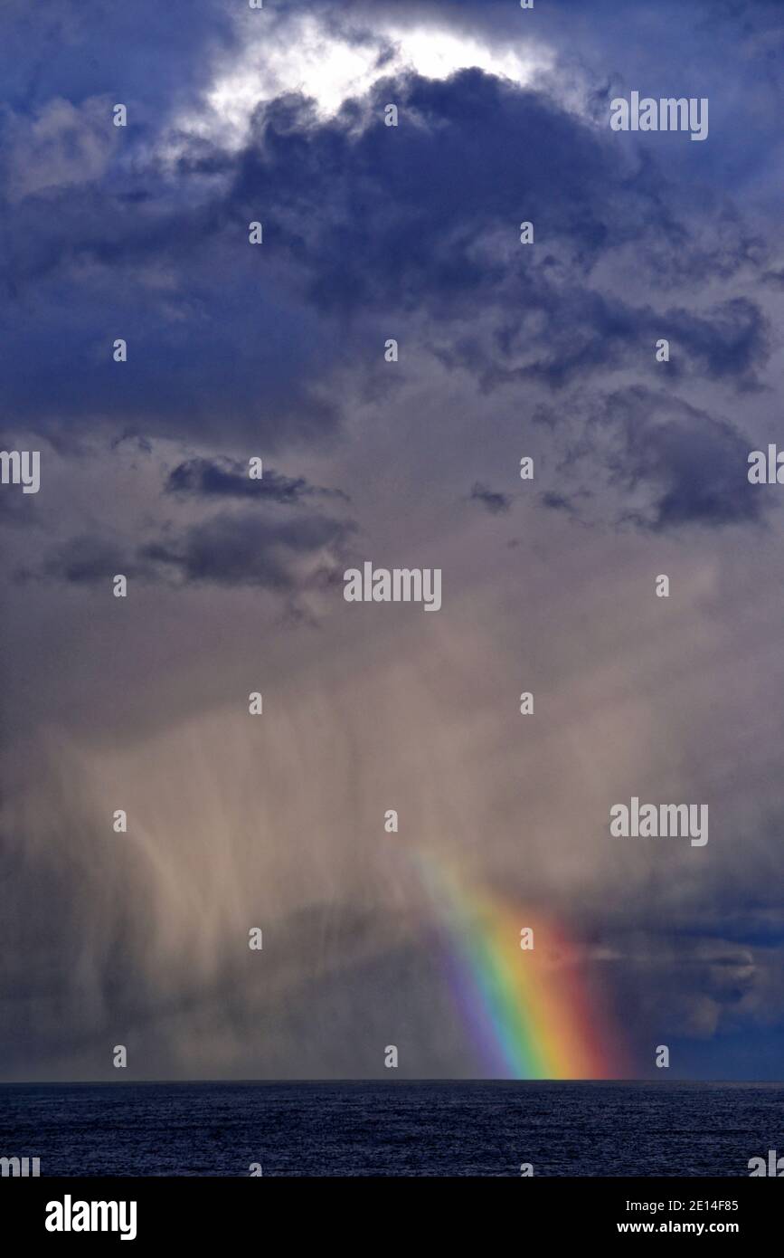 Stormy rainbow at sea Stock Photo - Alamy