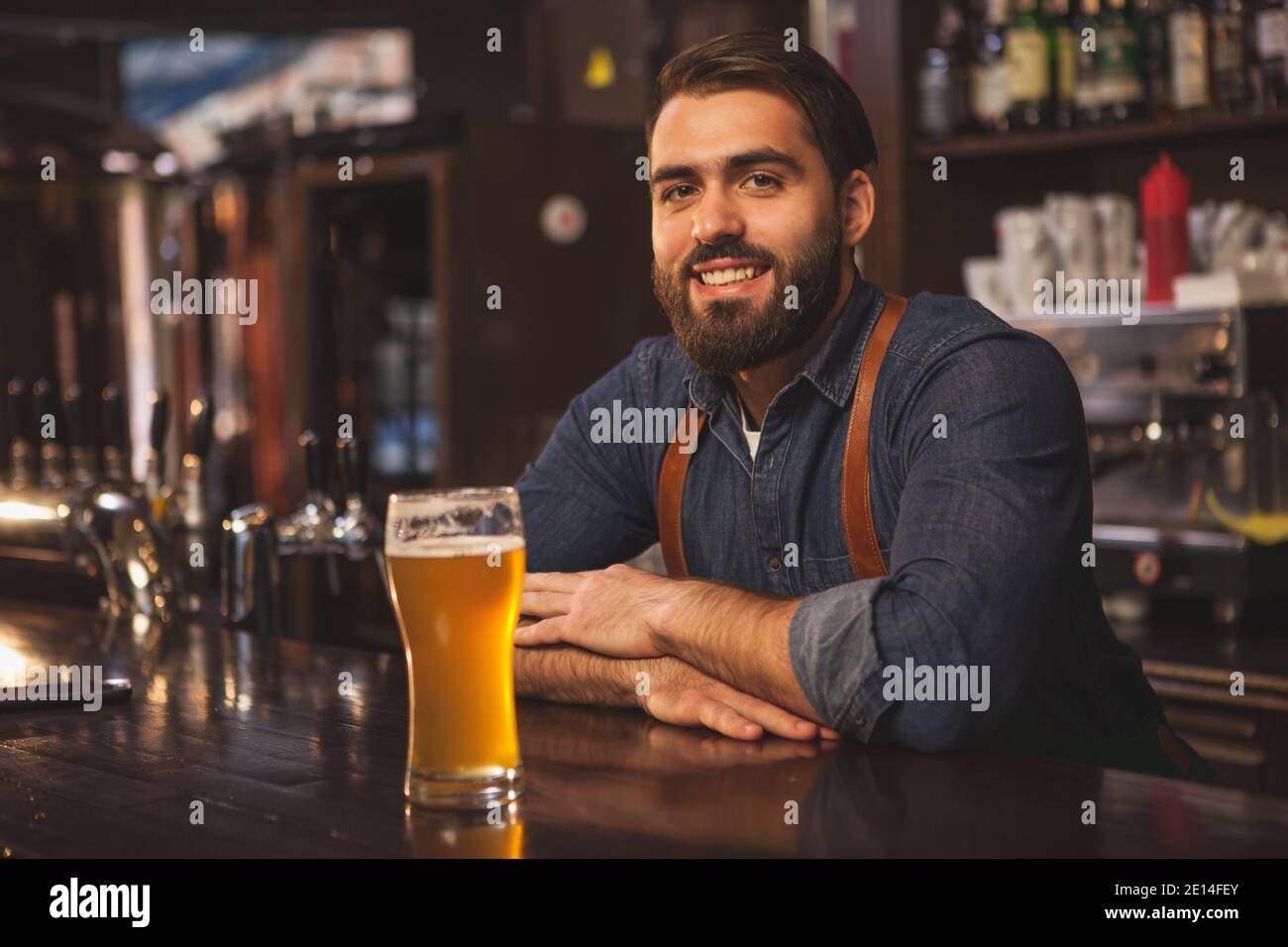 Bartender Leaning On Counter High Resolution Stock Photography and ...