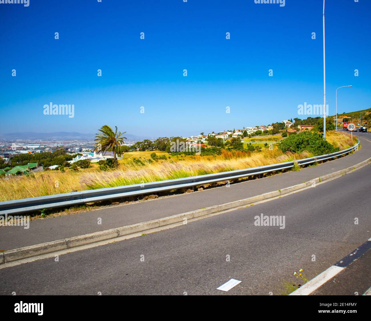 Cape Town, South Africa -  02/12/2020 Road curving around foot of Mountain in Cape Town. Stock Photo