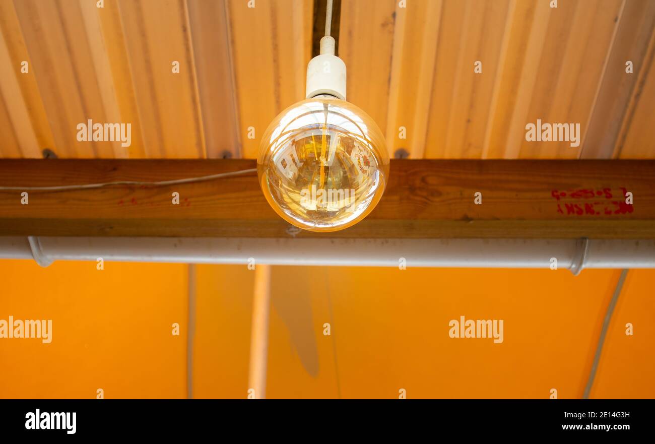 Observatory -  Cape Town, South Africa - 02/12/2020 The African Box. Light bulb hanging from restaurant ceiling. Stock Photo