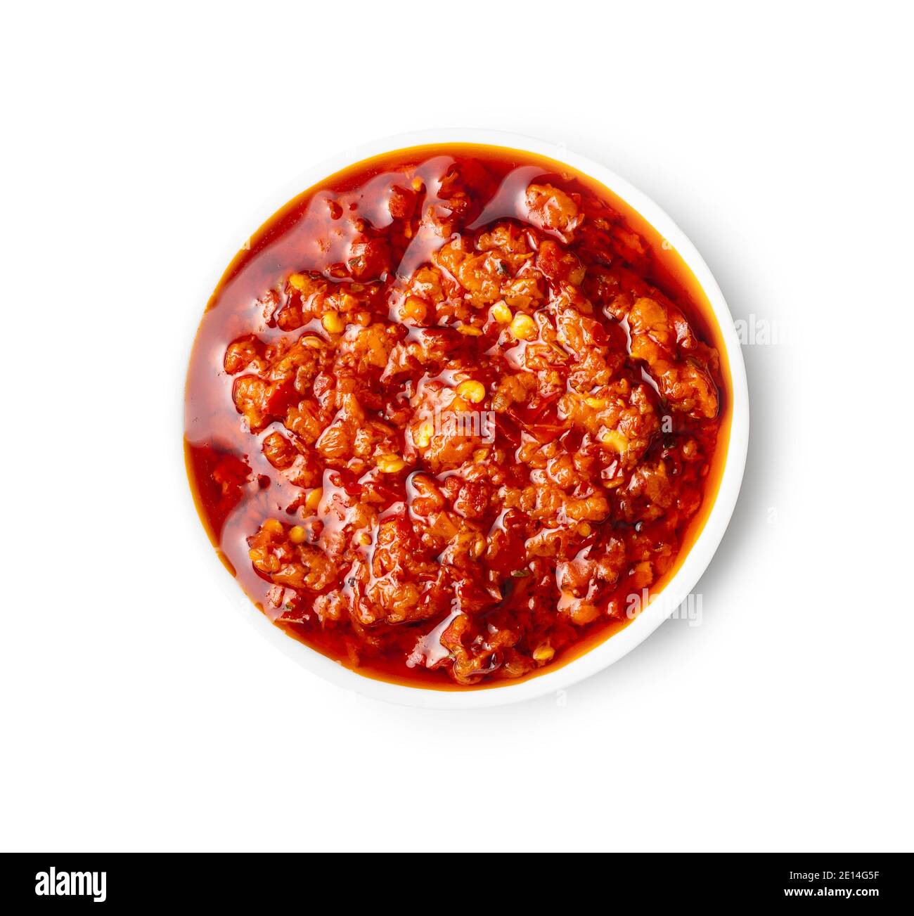 Red hot chili paste in bowl isolated on white background Stock Photo